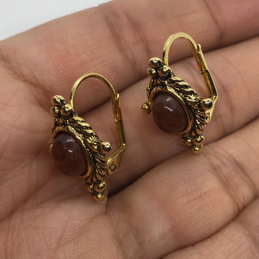 Gold tone and faux stone earrings with lever back